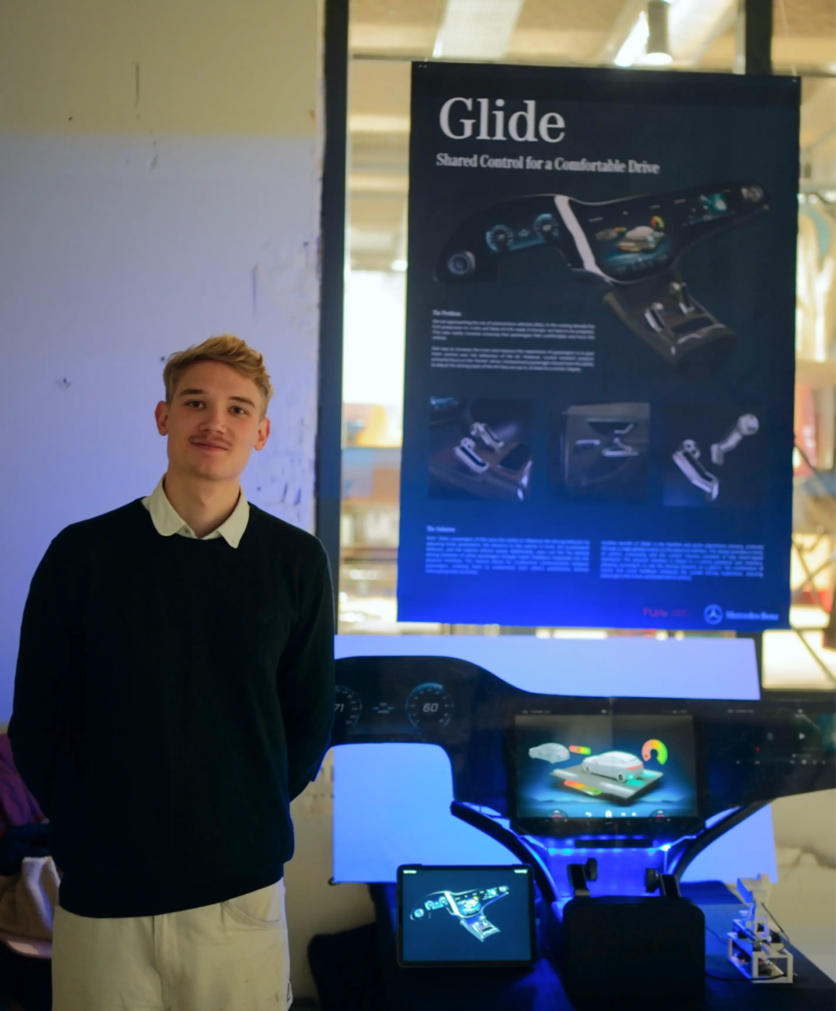 A hand on one of Glide's tangible controls in the built, working prototype: the same interface shown on the display above.