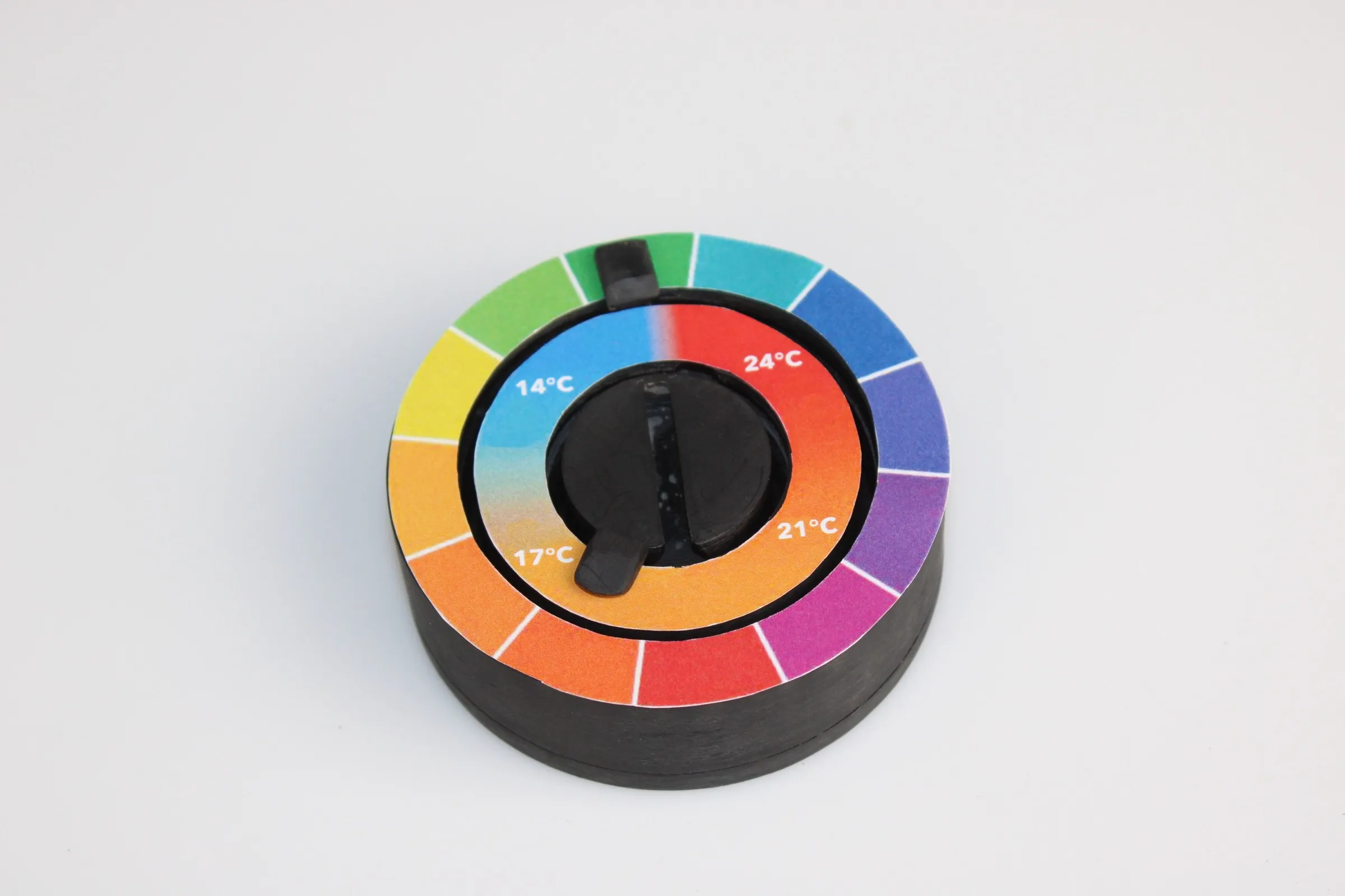 The finished hub with both rings docked: an outer colour wheel for light and an inner temperature gradient, sharing one black slider.